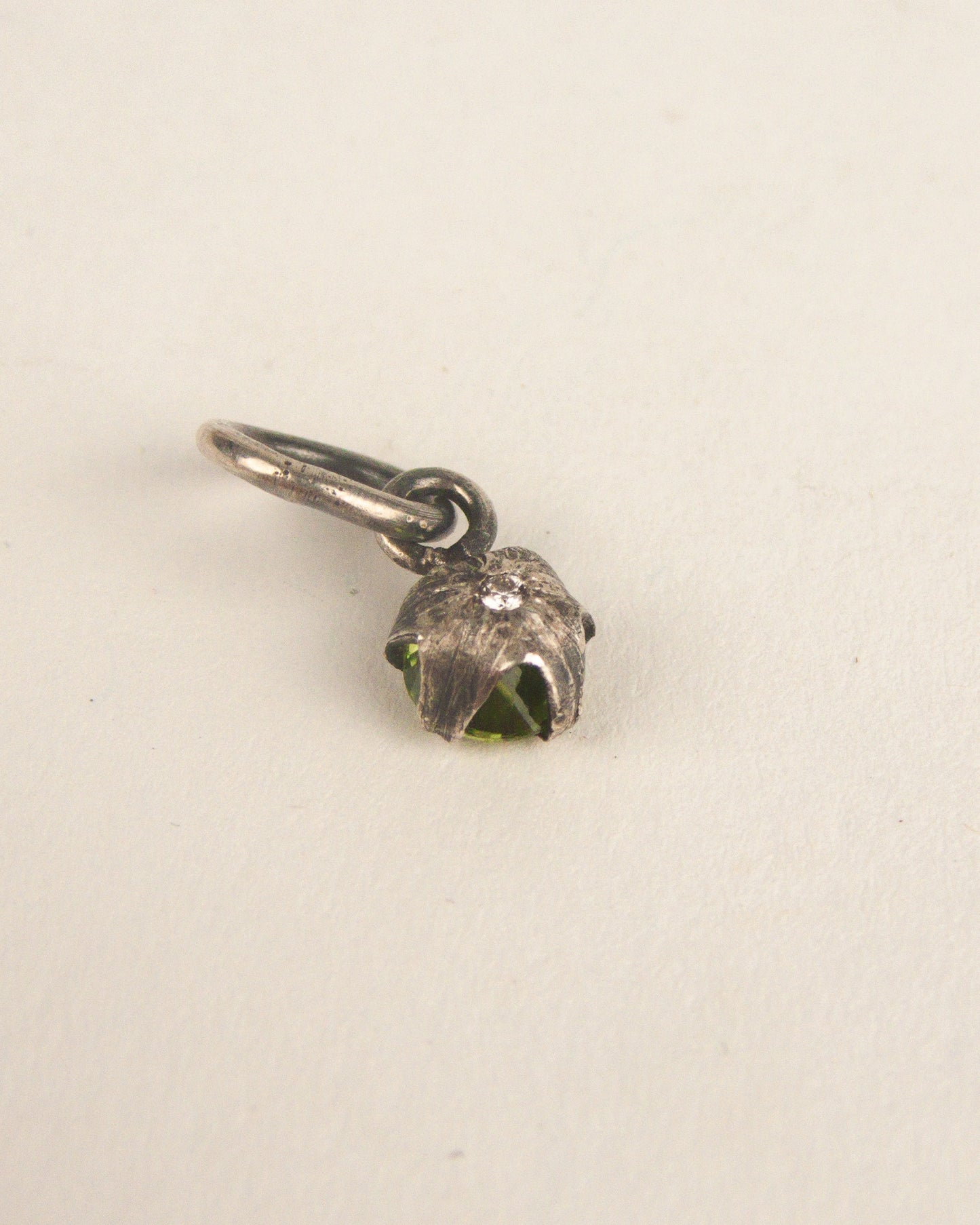Silver Tomato Star Charm with Diamond and Peridot