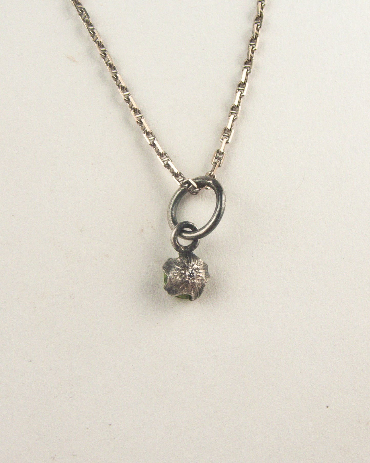 Silver Tomato Star Charm with Diamond and Peridot