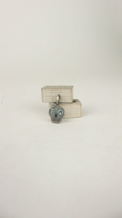 Skull Charm with Sapphire Eyes