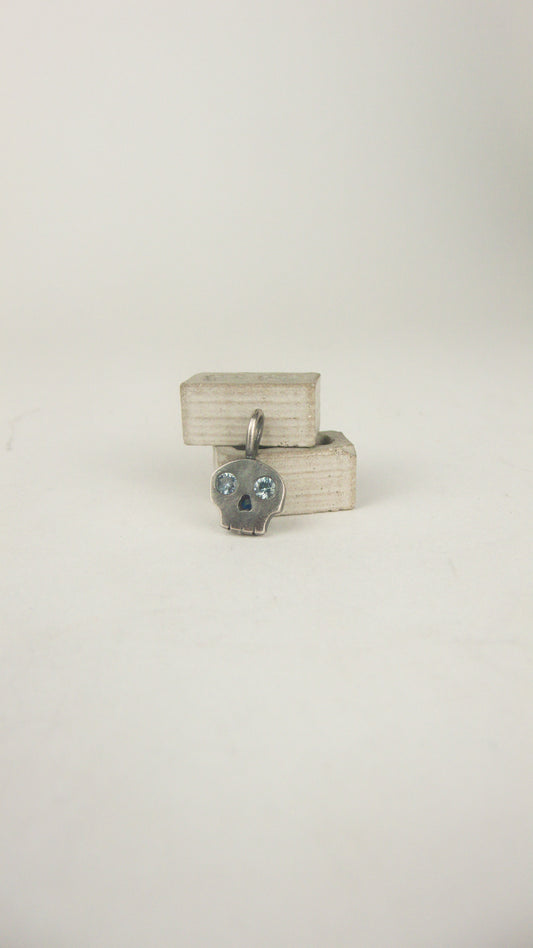 Skull Charm with Sapphire Eyes