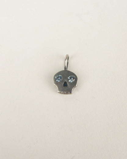 Skull Charm with Sapphire Eyes